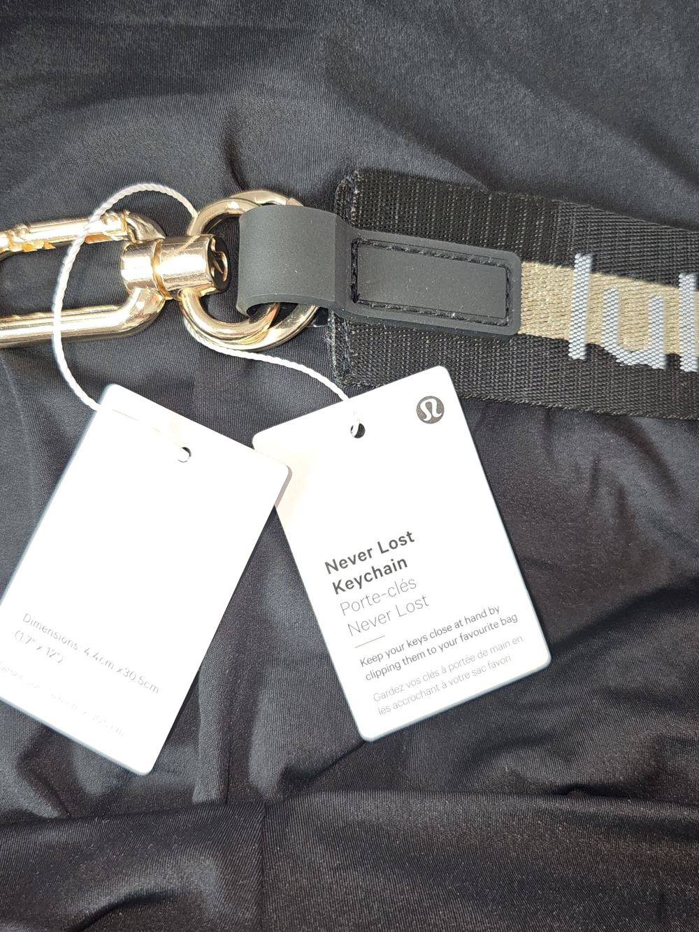 NWT lululemon athletica Black and Gold Never Lost Keychain - Picture 2 of 2